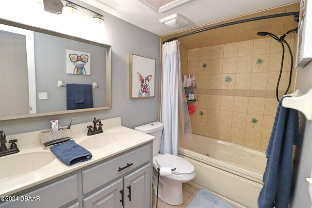 full bathroom featuring tile patterned floors, vanity, toilet, a textured ceiling, and shower / tub combo with curtain