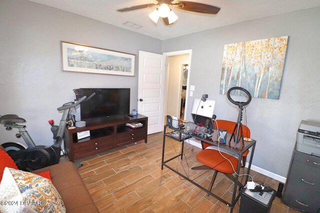 office area featuring ceiling fan and light hardwood / wood-style floors