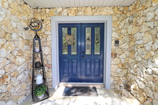 property entrance with french doors