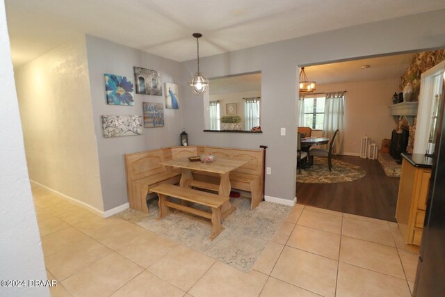 dining area with light hardwood / wood-style flooring