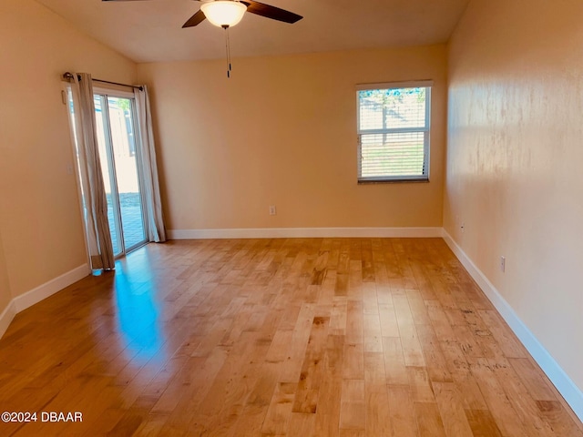 unfurnished room with light hardwood / wood-style floors and ceiling fan