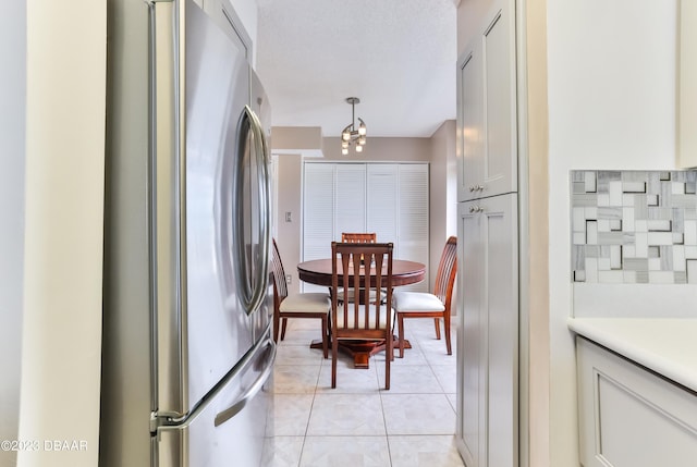 1183 Ocean Shore Blvd Unit 5050, Ormond Beach, FL 32176 - dining room with light tile patterned floors