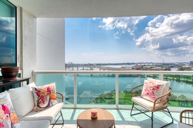 231 Riverside Dr Unit 1407, Holly Hill, FL 32117 - balcony with a water view