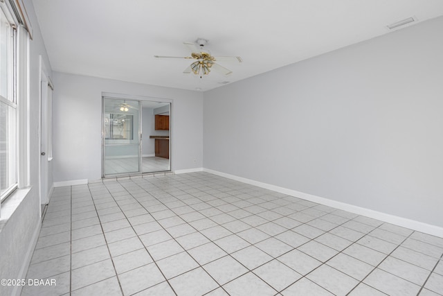 empty room featuring ceiling fan