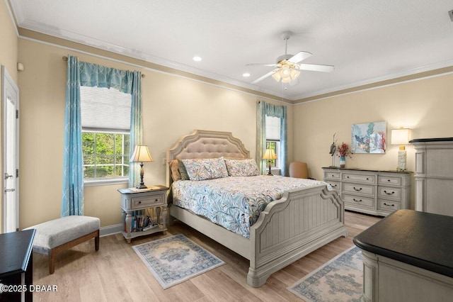 3428 Rexford Cir, Ormond Beach, FL 32174 - bedroom featuring ornamental molding, light wood-style floors, recessed lighting, baseboards, and a ceiling fan