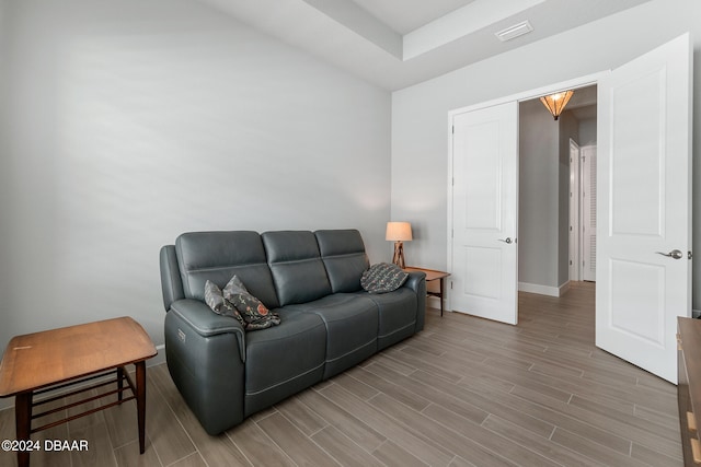 living room with light hardwood / wood-style floors