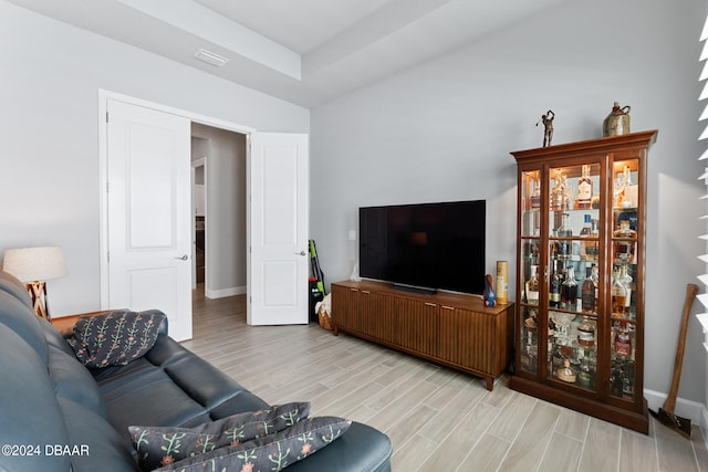 living room with light hardwood / wood-style flooring