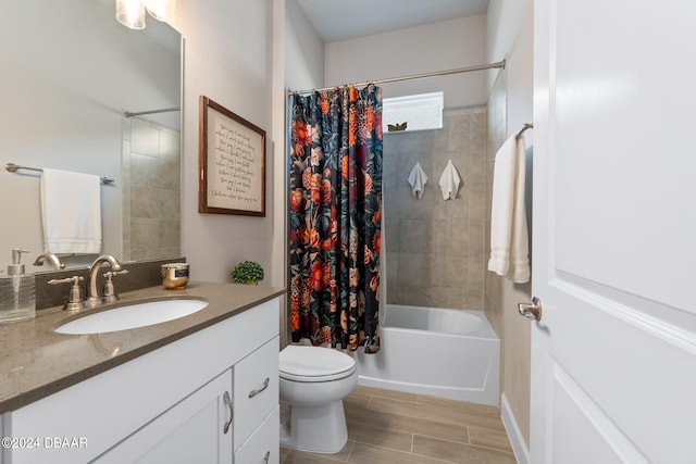 full bathroom with vanity, toilet, and shower / bath combination with curtain