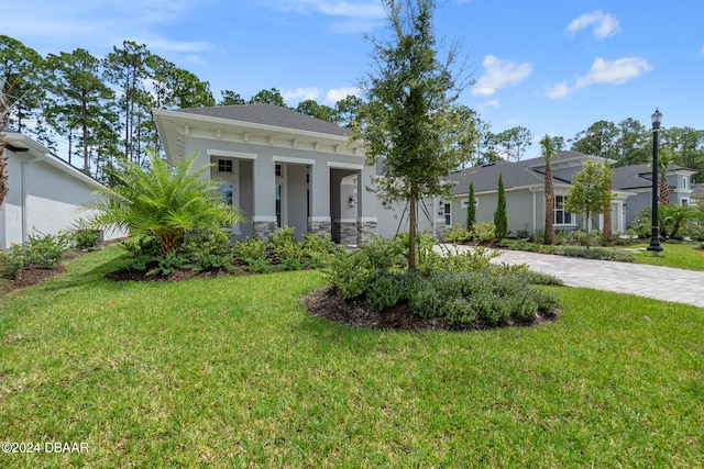 view of front of house with a front yard