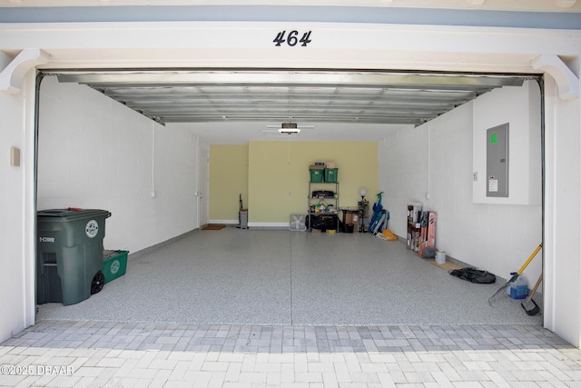 464 Tropics Ave, Daytona Beach, FL 32124 - garage with electric panel and a garage door opener