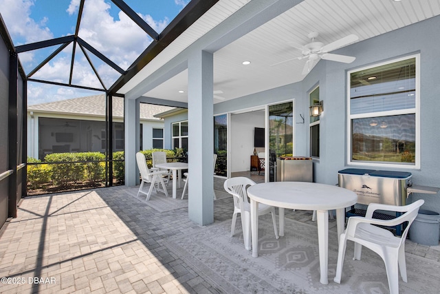 464 Tropics Ave, Daytona Beach, FL 32124 - sunroom / solarium with outdoor dining space, ceiling fan, and plenty of natural light