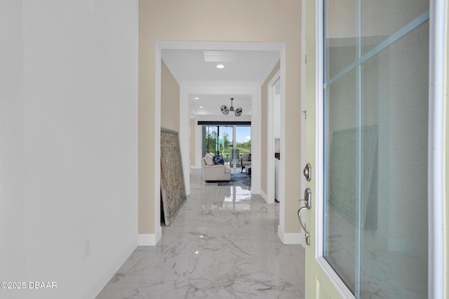 464 Tropics Ave, Daytona Beach, FL 32124 - corridor with light marble finish flooring, baseboards, crown molding, recessed lighting, and a chandelier