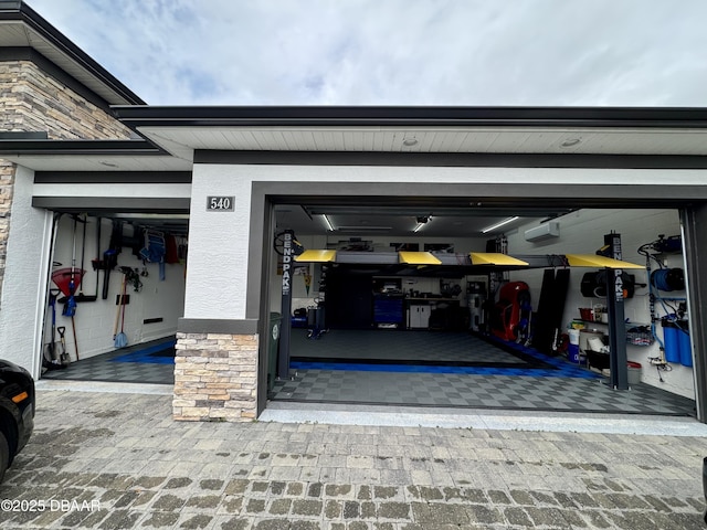 540 Mosaic Blvd, Daytona Beach, FL 32124 - garage with an AC wall unit