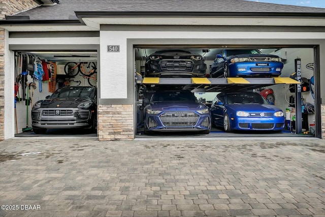 540 Mosaic Blvd, Daytona Beach, FL 32124 - garage featuring decorative driveway
