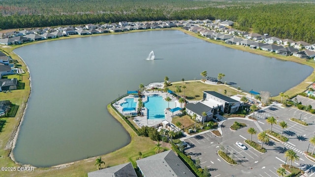 birds eye view of property with a residential view and a water view