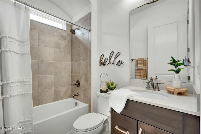 bathroom featuring vanity, toilet, and shower / tub combo with curtain