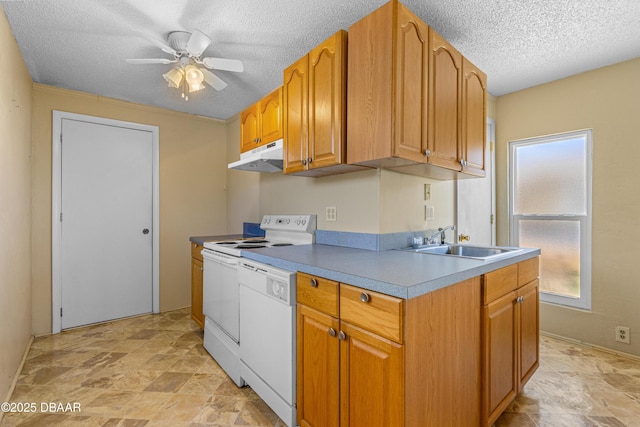1104 Jacaranda Ave, Daytona Beach, FL 32118 - kitchen featuring under cabinet range hood, white appliances, a textured ceiling, ceiling fan, and stone finish floors