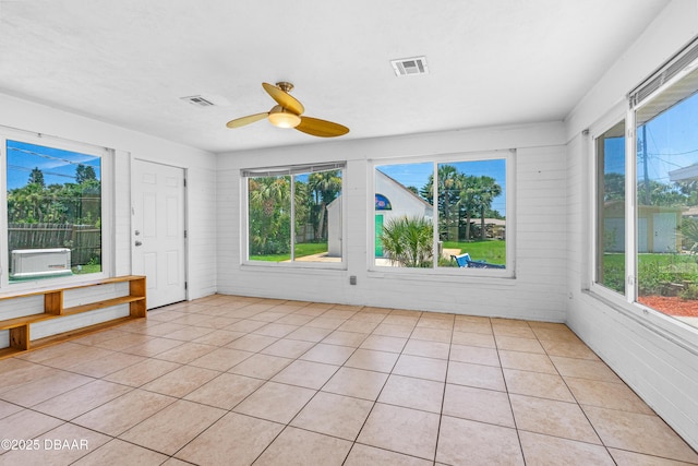 1104 Jacaranda Ave, Daytona Beach, FL 32118 - unfurnished sunroom featuring plenty of natural light