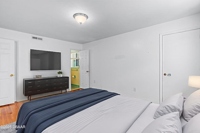 1104 Jacaranda Ave, Daytona Beach, FL 32118 - bedroom with light wood-type flooring