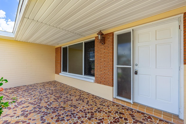 1104 Jacaranda Ave, Daytona Beach, FL 32118 - property entrance featuring brick siding