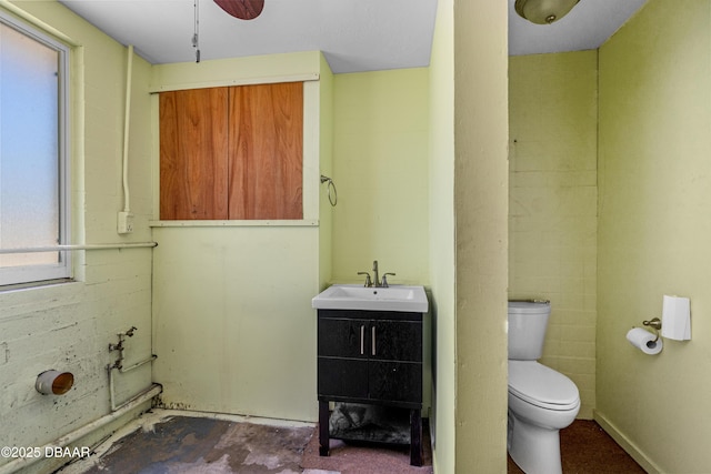 1104 Jacaranda Ave, Daytona Beach, FL 32118 - bathroom with healthy amount of natural light, vanity, and a ceiling fan