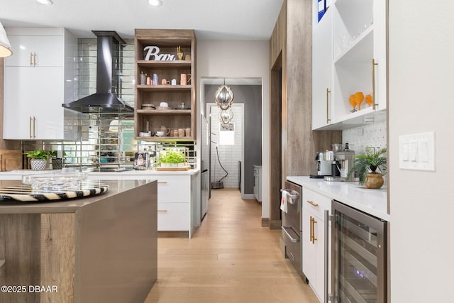 75 Trailmark Ct, Ormond Beach, FL 32174 - kitchen featuring beverage cooler, wall chimney range hood, open shelves, white cabinetry, and recessed lighting