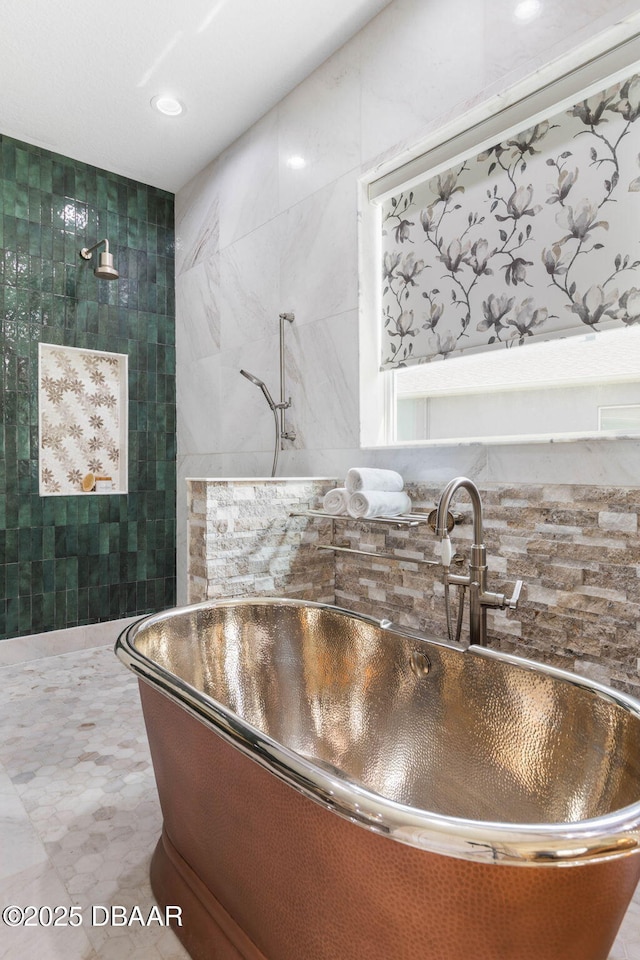 75 Trailmark Ct, Ormond Beach, FL 32174 - bathroom view of a freestanding bath and recessed lighting