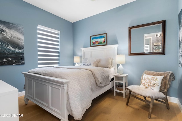 75 Trailmark Ct, Ormond Beach, FL 32174 - bedroom featuring wood finished floors and baseboards