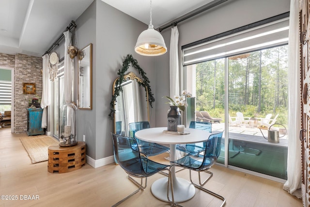 75 Trailmark Ct, Ormond Beach, FL 32174 - dining space with wood finished floors and baseboards