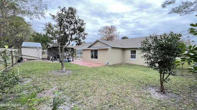 view of yard with a patio area and a shed