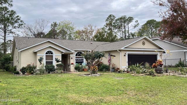 single story home with a garage and a front lawn