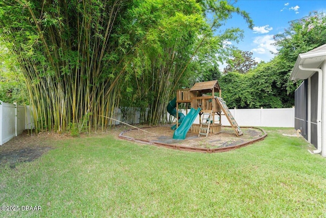36 Allenwood Look, Ormond Beach, FL 32174 - fenced backyard with a playground