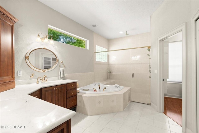 36 Allenwood Look, Ormond Beach, FL 32174 - full bathroom featuring vanity, a stall shower, a bath, and tile patterned floors