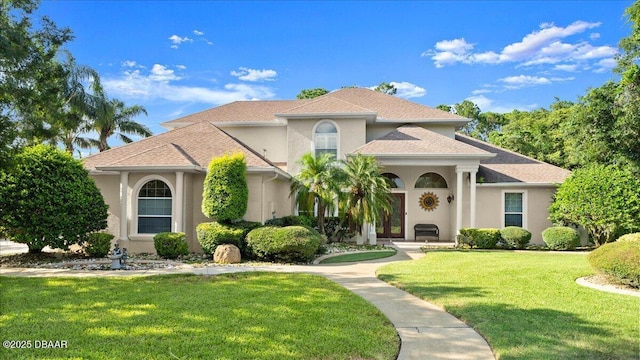 36 Allenwood Look, Ormond Beach, FL 32174 - mediterranean / spanish-style home featuring stucco siding and a front yard