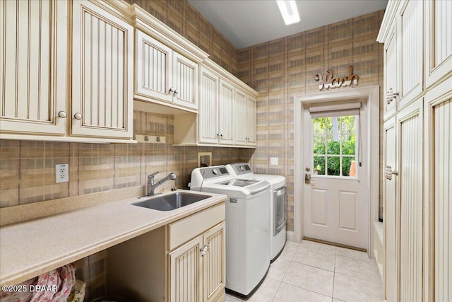 36 Allenwood Look, Ormond Beach, FL 32174 - laundry room featuring separate washer and dryer, cabinet space, and light tile patterned floors