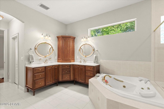 36 Allenwood Look, Ormond Beach, FL 32174 - full bath featuring tile patterned floors, double vanity, and a whirlpool tub