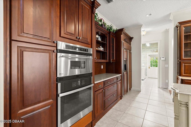36 Allenwood Look, Ormond Beach, FL 32174 - kitchen with stainless steel double oven, light tile patterned floors, paneled fridge, crown molding, and open shelves