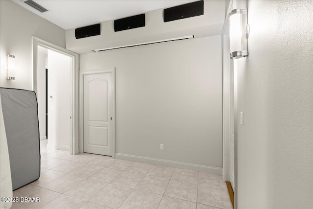 36 Allenwood Look, Ormond Beach, FL 32174 - unfurnished bedroom with light tile patterned floors and baseboards