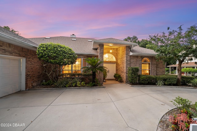 view of front of home with a garage