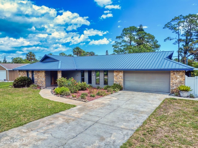 108 Dee St, New Smyrna Beach, FL 32168 - view of front of property with stone siding, driveway, a garage, metal roof, and a standing seam roof