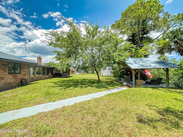 108 Dee St, New Smyrna Beach, FL 32168 - view of green lawn with a gazebo