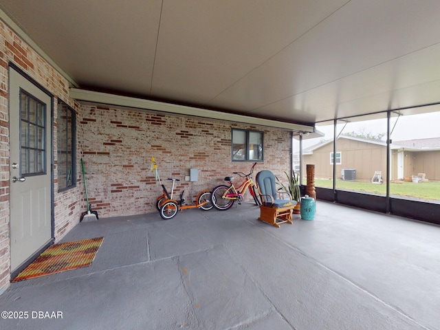 108 Dee St, New Smyrna Beach, FL 32168 - view of patio / terrace featuring central AC