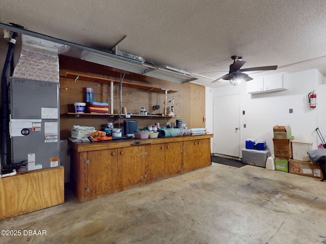 108 Dee St, New Smyrna Beach, FL 32168 - garage with a ceiling fan and a workshop area