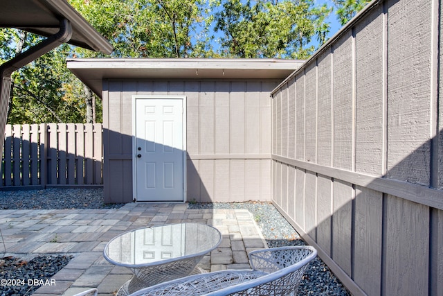 property entrance with a patio area