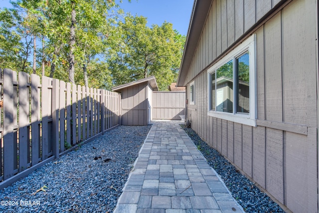 view of side of home featuring a patio