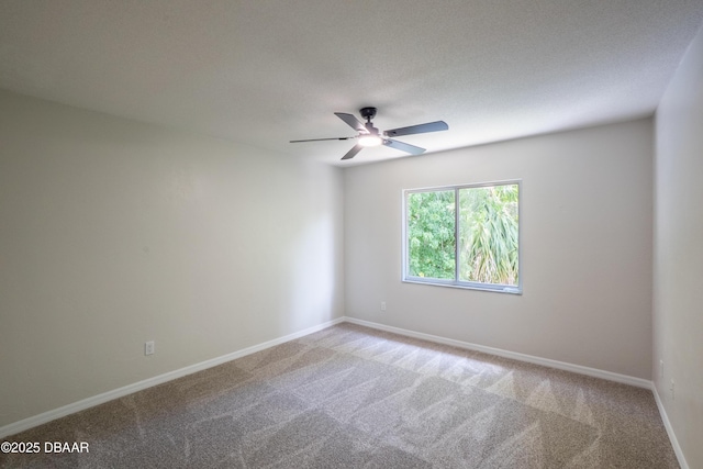 15 Misners Trl, Ormond Beach, FL 32174 - spare room featuring a ceiling fan, carpet floors, and baseboards