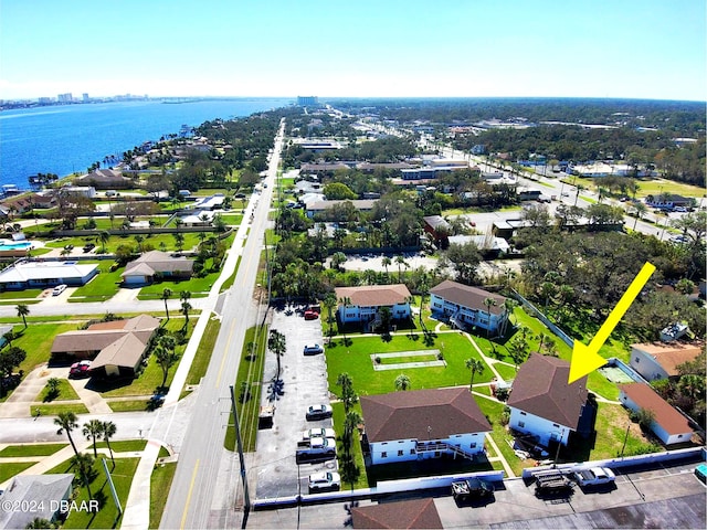 birds eye view of property featuring a water view