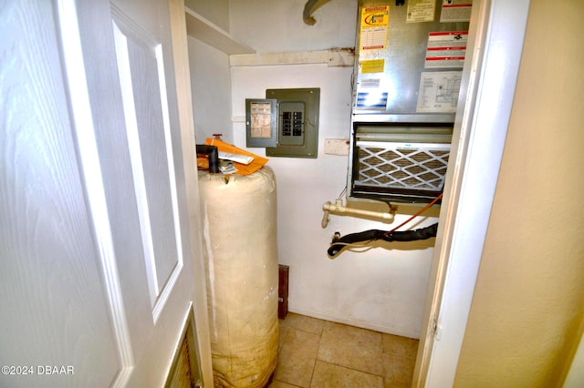 interior space with electric panel and tile patterned floors