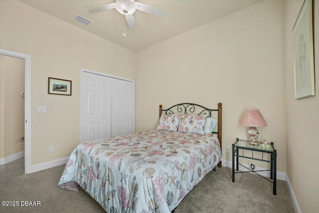 bedroom featuring carpet, a closet, visible vents, and baseboards