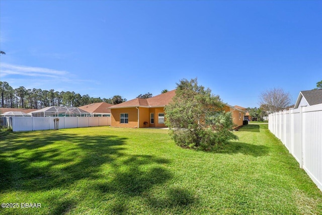 view of yard featuring fence